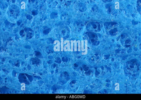 Una cucina blu panno spugna in extreme close up. È possibile se i pori nel tessuto. Foto Stock