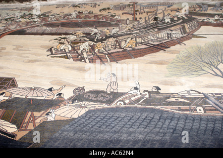 Seta Cinese tappeto raffigurante la Battaglia Navale Foto Stock