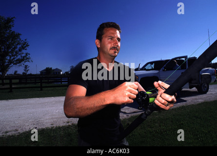 Alligatore con licenza catturatori in Florida alligatori si trovano in luoghi pubblici in tutto lo stato Foto Stock