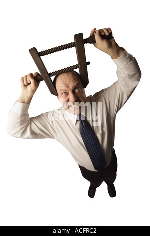 Imprenditore con testa nella morsa Foto Stock