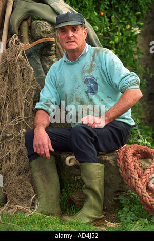 BRENDAN SELLICK L'ultimo pescatore di gamberi utilizzando un cavallo di fango sulle velme di Bridgwater Bay SOMERSET REGNO UNITO Foto Stock