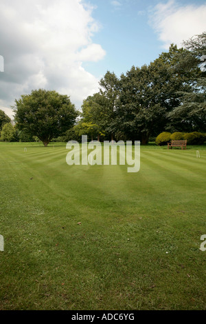 Inglese Croquet prato a West Dean Gardens, West Sussex, Inghilterra, Regno Unito Foto Stock