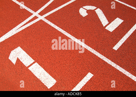 Esecuzione di un corso di stadium Tartanbahn Start Foto Stock