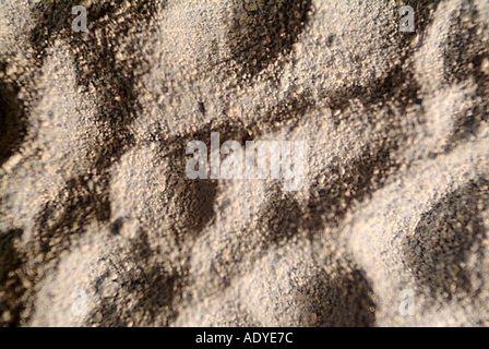 Gli sfondi di sabbia i chicchi di grano irregolare spiaggia deserta varie texture di sfondo Foto Stock