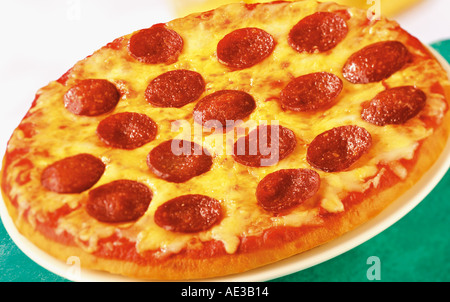 PIZZA AI PEPERONI Foto Stock