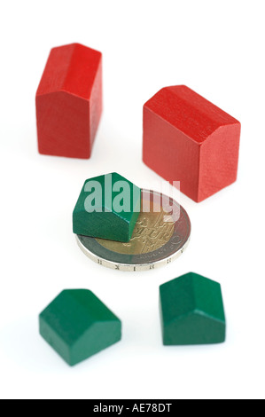 Case di monopolio su una moneta in euro Foto Stock