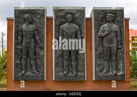 Memoriale di Bela Kun, Jeno Landler e Tibor Szamuely, Szobor (statua) park, Budapest, Ungheria Foto Stock