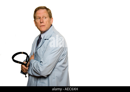 Medico ritratto indossando giacca grigia Foto Stock