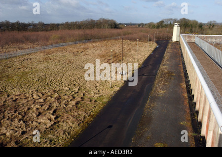 Parete perimetrale e torre di guardia presso il carcere di Maze, H blocchi, al di fuori di Belfast. Irlanda del Nord Foto Stock