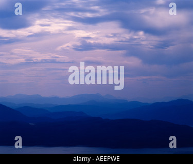 Lontane colline di Western Isles della Scozia Foto Stock