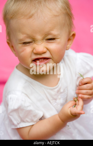 Ritratto di un 10 mesi Baby girl Foto Stock