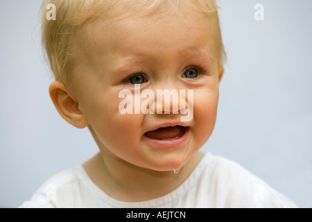 Ritratto di un 10 mesi Baby girl Foto Stock