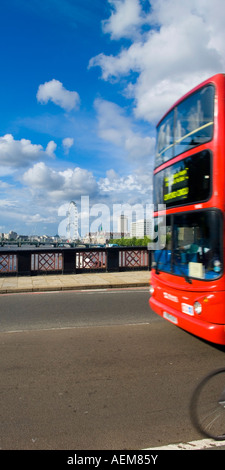 London red Double decker bus and bicycle crossing River Thames on Lambeth Bridge London England Foto Stock