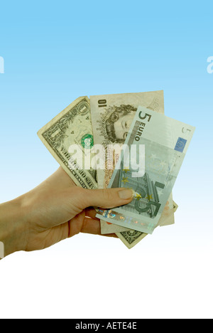 Mano azienda valuta misti di banconote Foto Stock