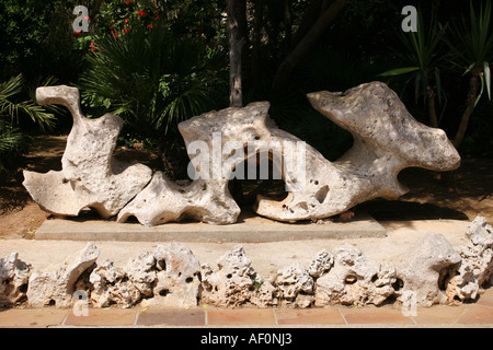 Il drago di pietra che è il simbolo di Cuevas del Drach o calette del Drac e le Grotte del Drago Foto Stock