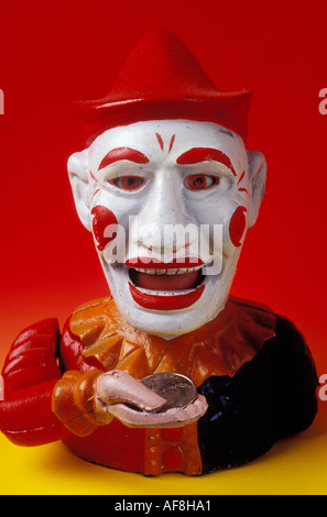 Banca Clown su red garckground Foto Stock