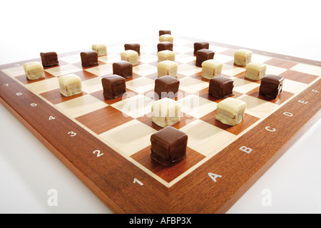 I cookie di Domino su scacchiera Foto Stock