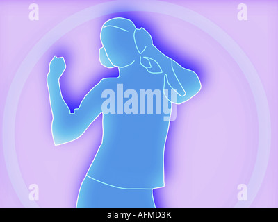 Donna che indossa le cuffie e dancing Foto Stock