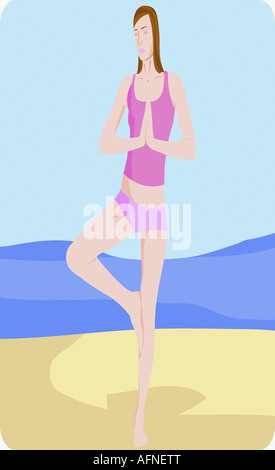 Giovane donna a praticare yoga sulla spiaggia Foto Stock