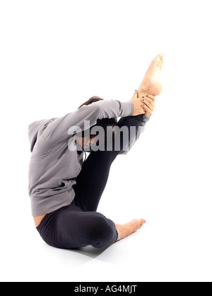 Donna stretching modello rilasciato Foto Stock