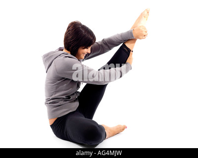 Donna stretching modello rilasciato Foto Stock