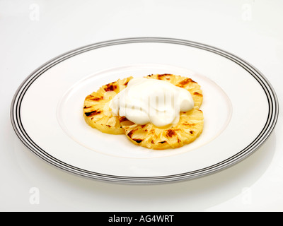 Arrosto di fette di ananas Foto Stock