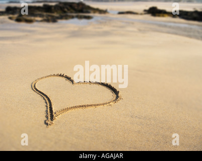 Cuore disegnato nella sabbia Foto Stock
