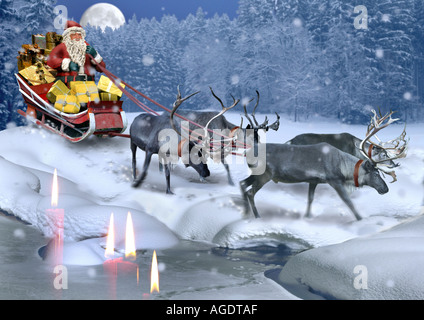 Le renne con slitta e Babbo Natale Foto Stock