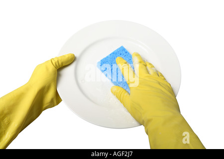 Le mani nei guanti di gomma della piastra di lavaggio Foto Stock