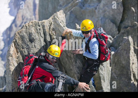 Gli alpinisti sul Grand Montets al di sopra di Chamonix Francia Foto Stock