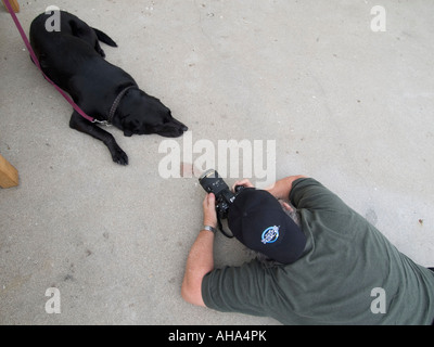 Fotografo e cane Foto Stock