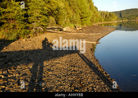 San Giovanni Fiume New Brunswick Canada al tramonto con lunga ombra del fotografo Foto Stock