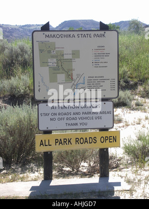 Segno e mappa di 'Makoshika parco dello stato" Foto Stock