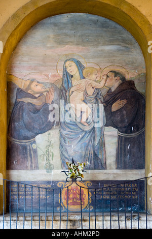 La pittura religiosa sul Ponte degli Alpini ponte coperto di Bassano del Grappa Italia Foto Stock