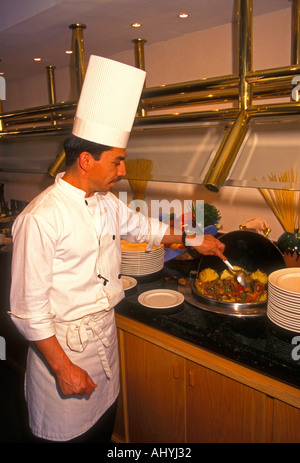 1, uno Messicano, uomo adulto uomo, maschio chef, chef, Cook, lavorando, ristorante messicano, Messicana, alimenti e bevande, città di Leon, stato di Guanajuato, Messico Foto Stock