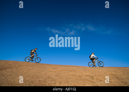 Persone in mountain bike Foto Stock