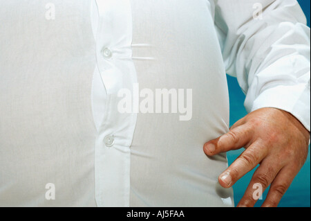 Il sovrappeso Uomo in camicia a tenuta Foto Stock