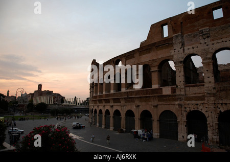 The Colosseum looking towards the imperial forum at dusk Rome Lazio Italy Foto Stock