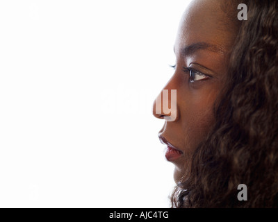 Profilo di una donna africana Foto Stock