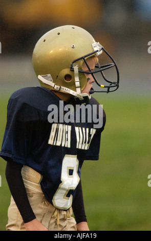 La gioventù biddy football americano in azione Foto Stock