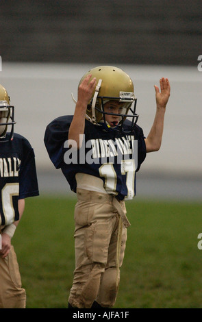 La gioventù biddy football americano in azione Foto Stock