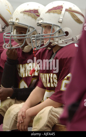 La gioventù biddy football americano in azione Foto Stock