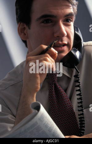 Ho potuto già nel suo ufficio networking sul telefono Foto Stock