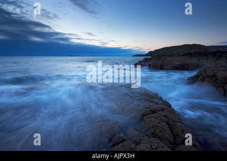 Duntulm sulla punta settentrionale di Skye guardando verso le Ebridi Esterne Foto Stock