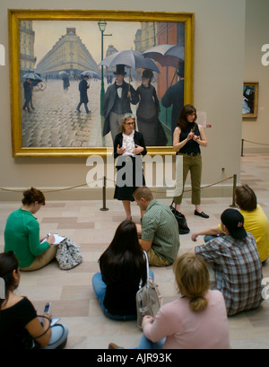 Tour del Museo e guida il suo traduttore del linguaggio dei segni una lezione a un gruppo di studenti Foto Stock