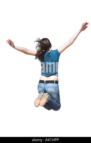 Donna allegra jumping Foto Stock