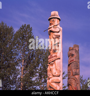 Gitxsan (Gitksan) Totem Poles a Ksan Villaggio Storico e Museo, Hazelton, Northern BC, British Columbia, Canada Foto Stock