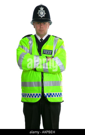 La metropolitan police officer in una alta visibilità camicia e indossa un custode tradizionale casco Foto Stock