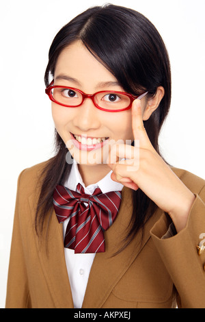 Alta scuola ragazza con gli occhiali Foto Stock