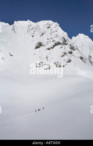 Parte di arrampicata su Davis campo di neve al di sopra del Ghiacciaio Franz Josef costa ovest di Isola del Sud della Nuova Zelanda antenna Foto Stock